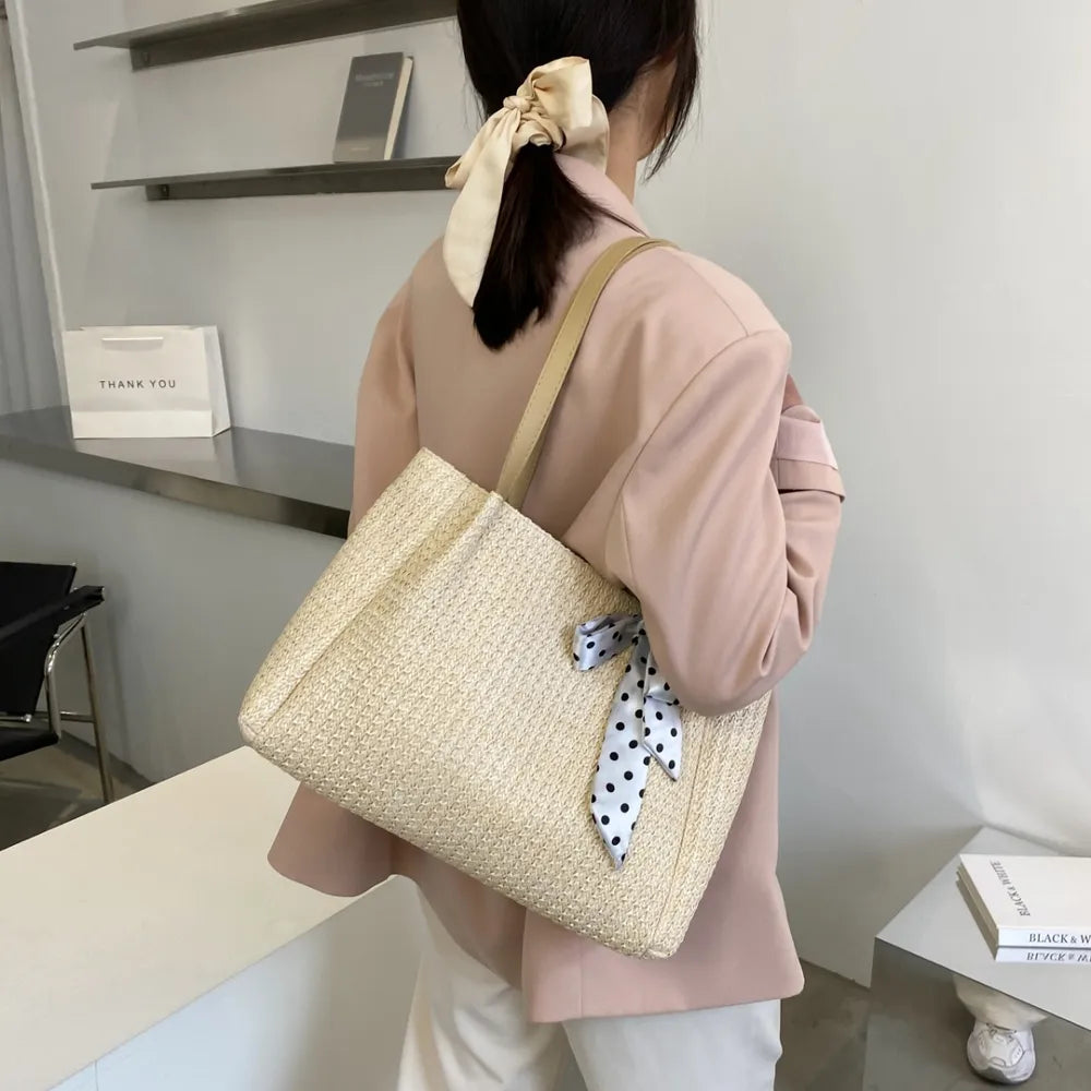 SOLINE – Woven Summer Bag with Leather Details & Bow Accent