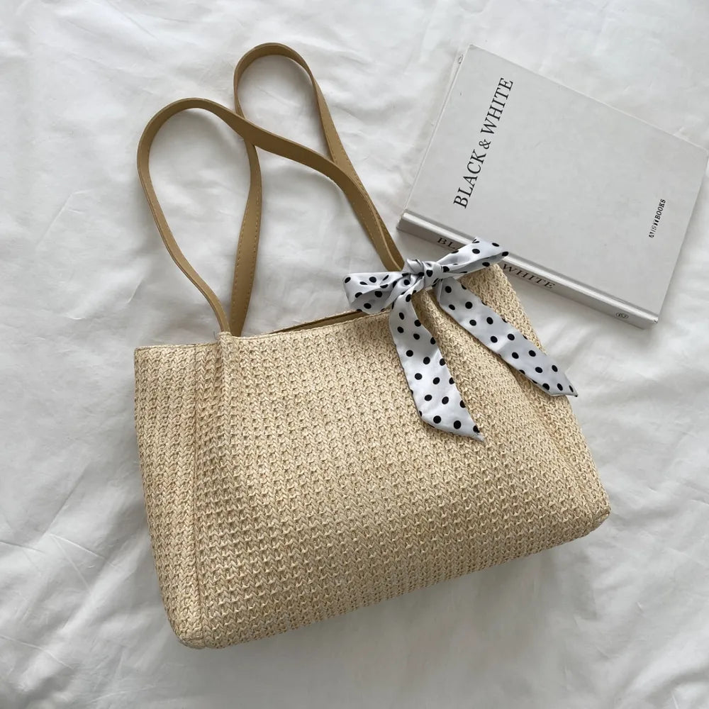 SOLINE – Woven Summer Bag with Leather Details & Bow Accent