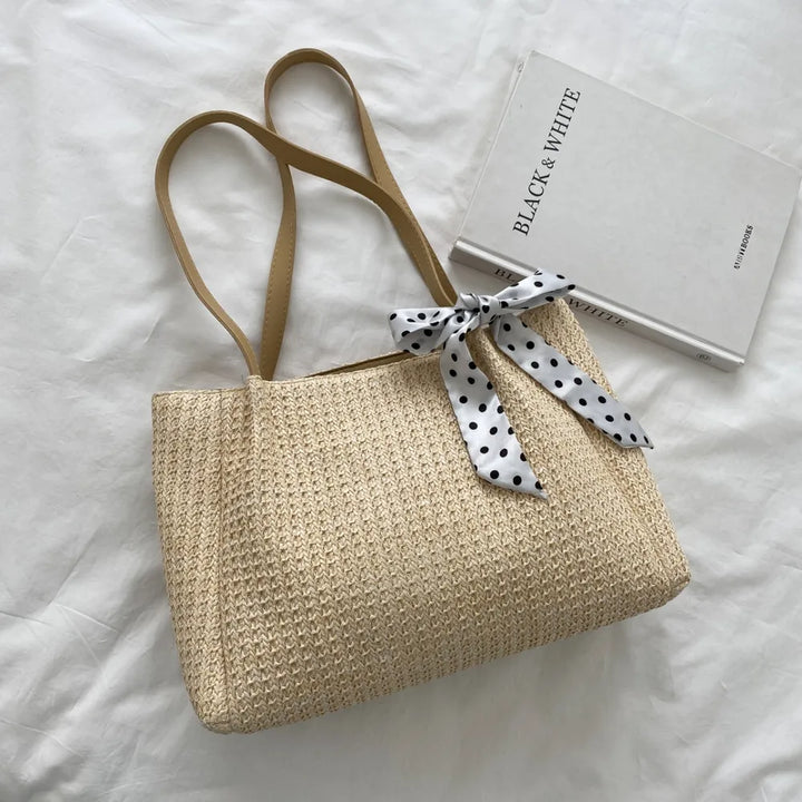 SOLINE – Woven Summer Bag with Leather Details & Bow Accent