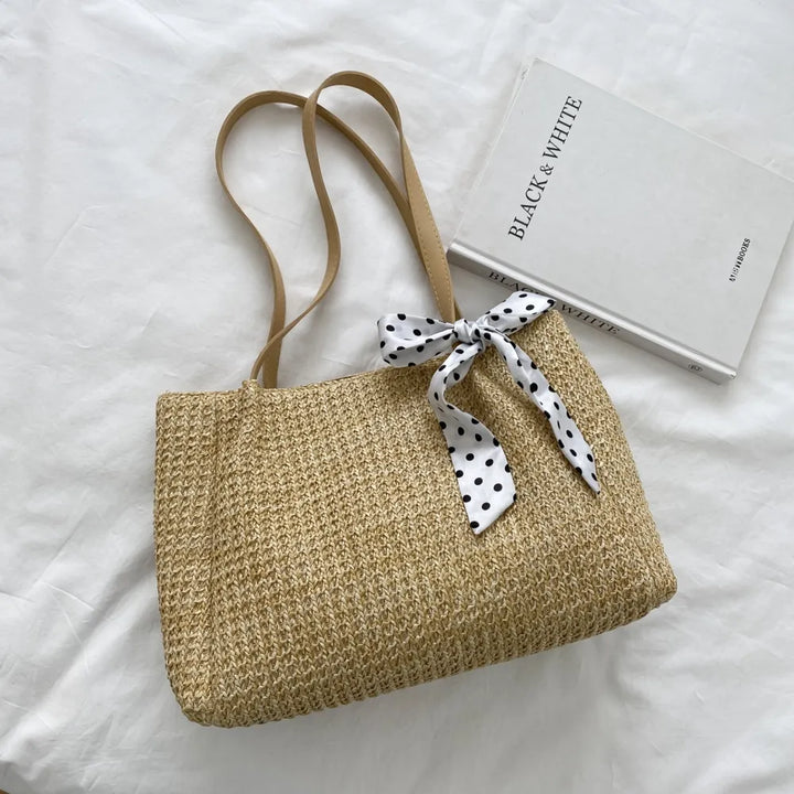 SOLINE – Woven Summer Bag with Leather Details & Bow Accent