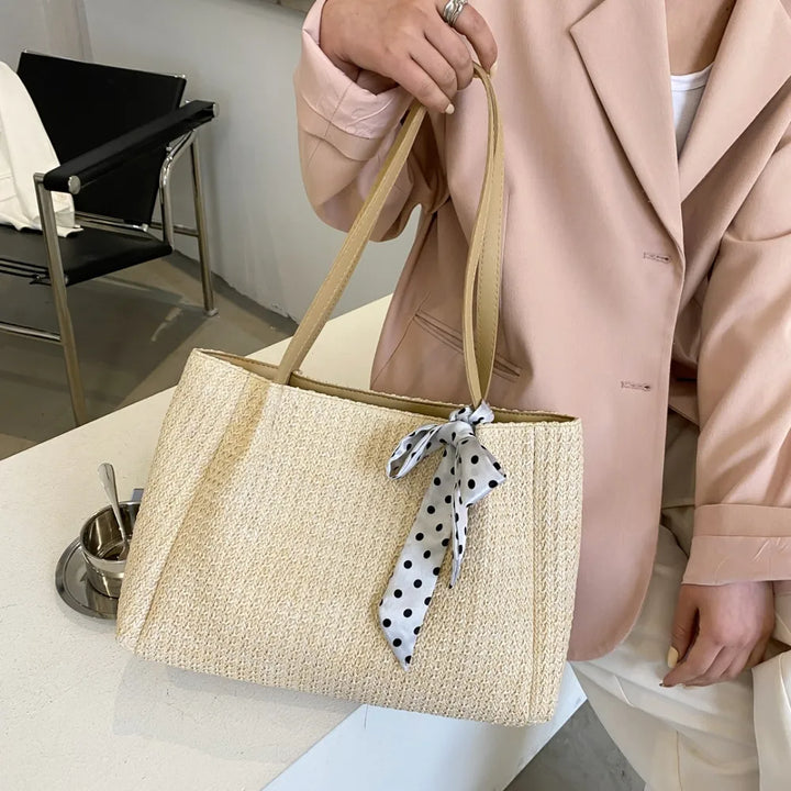SOLINE – Woven Summer Bag with Leather Details & Bow Accent