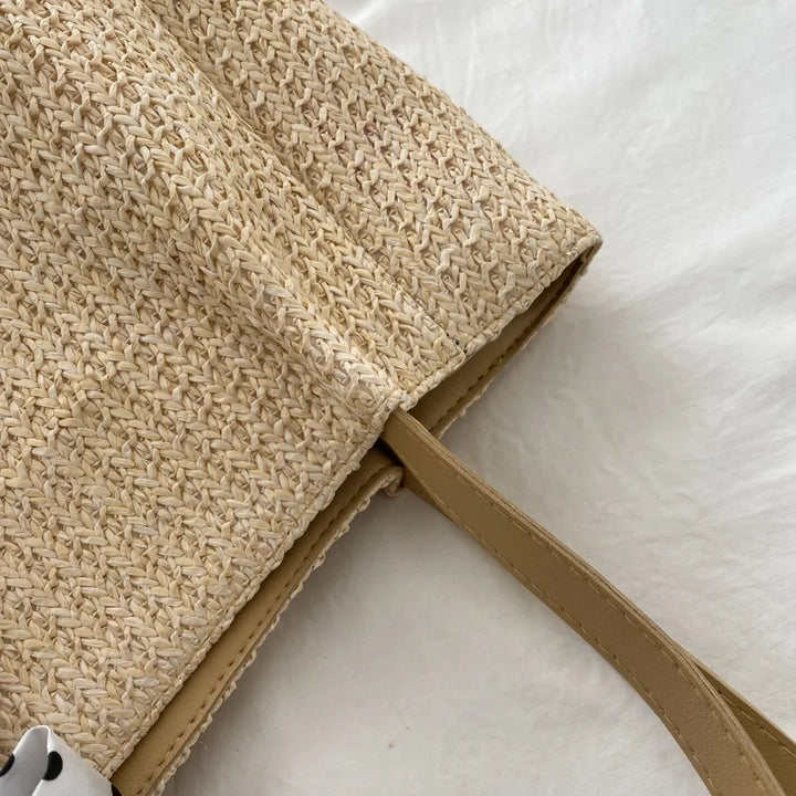 SOLINE – Woven Summer Bag with Leather Details & Bow Accent